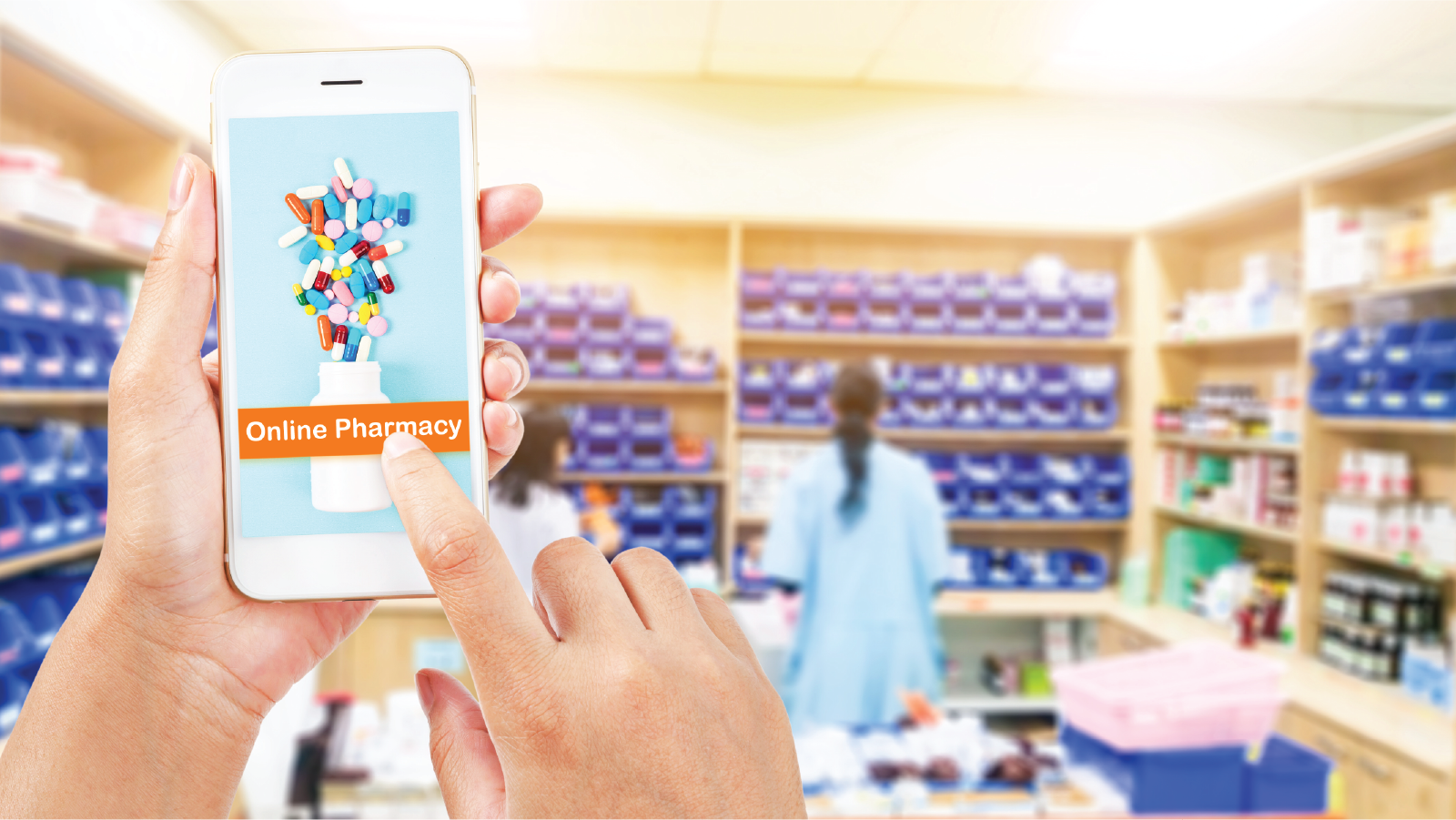 Person using a cell phone in a pharmacy