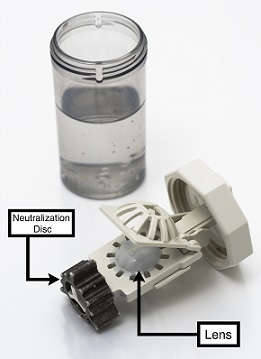 Image showing hydrogen peroxide solution, as well as neutralization disc and lens.
