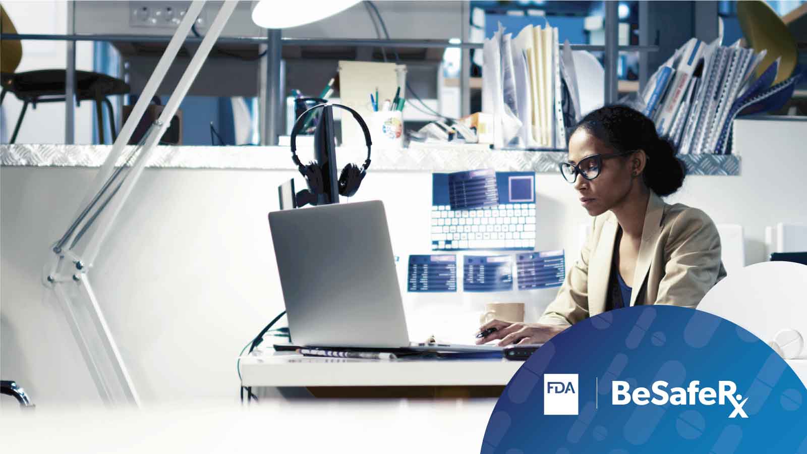 Woman Working on a Computer in Her Office