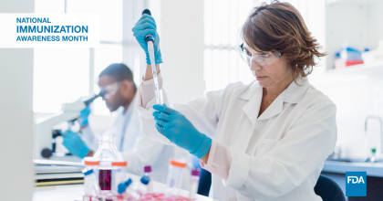 Photo of female lab technician running tests on new immunizations.