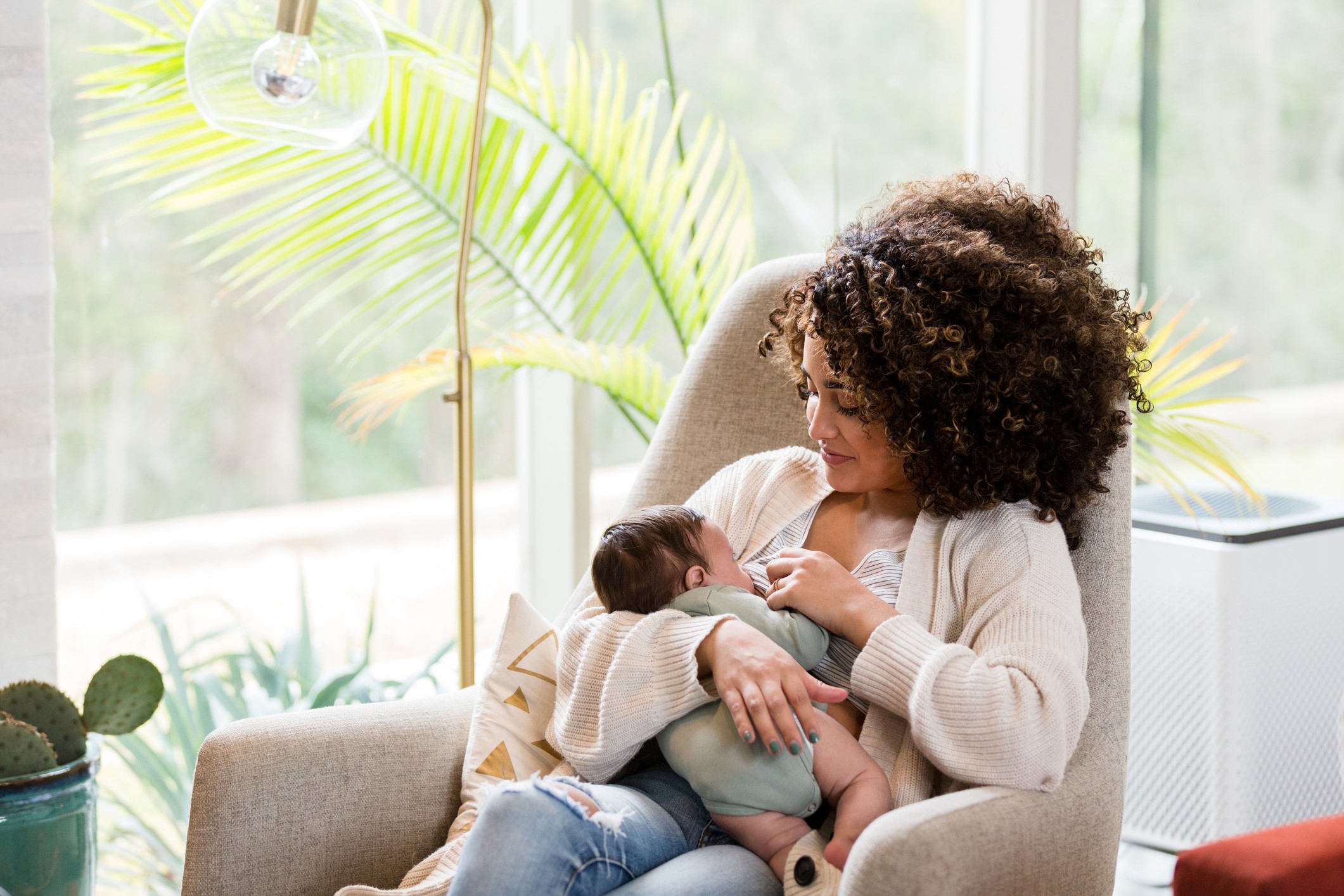 Woman Breastfeeding Baby