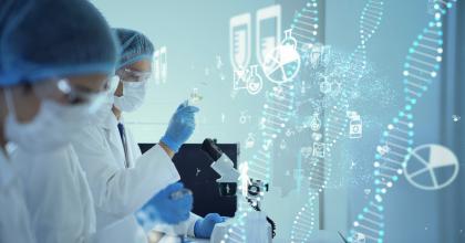 Scientists in a biologic research lab with microscope, test tube and DNA helix.