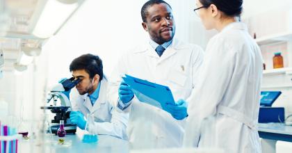 Three minority scientist in a lab