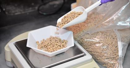 animal feed being weighed on a scale