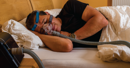 Man Using a CPAP Machine