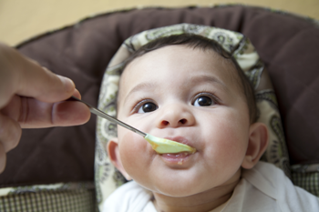 baby eating baby food