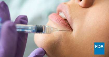 A woman getting an injection near her lips.