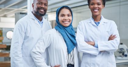 Portrait of a group of scientists working in a lab