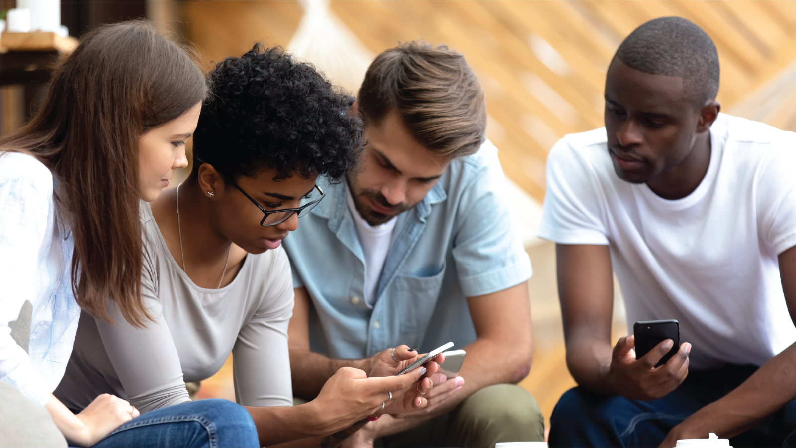 Gathering of diverse people on their phones