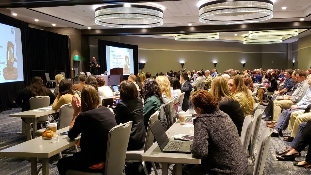 An FDA official giving a presentation at an industry conference