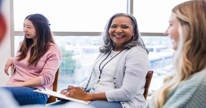 Diverse women discussing in small group