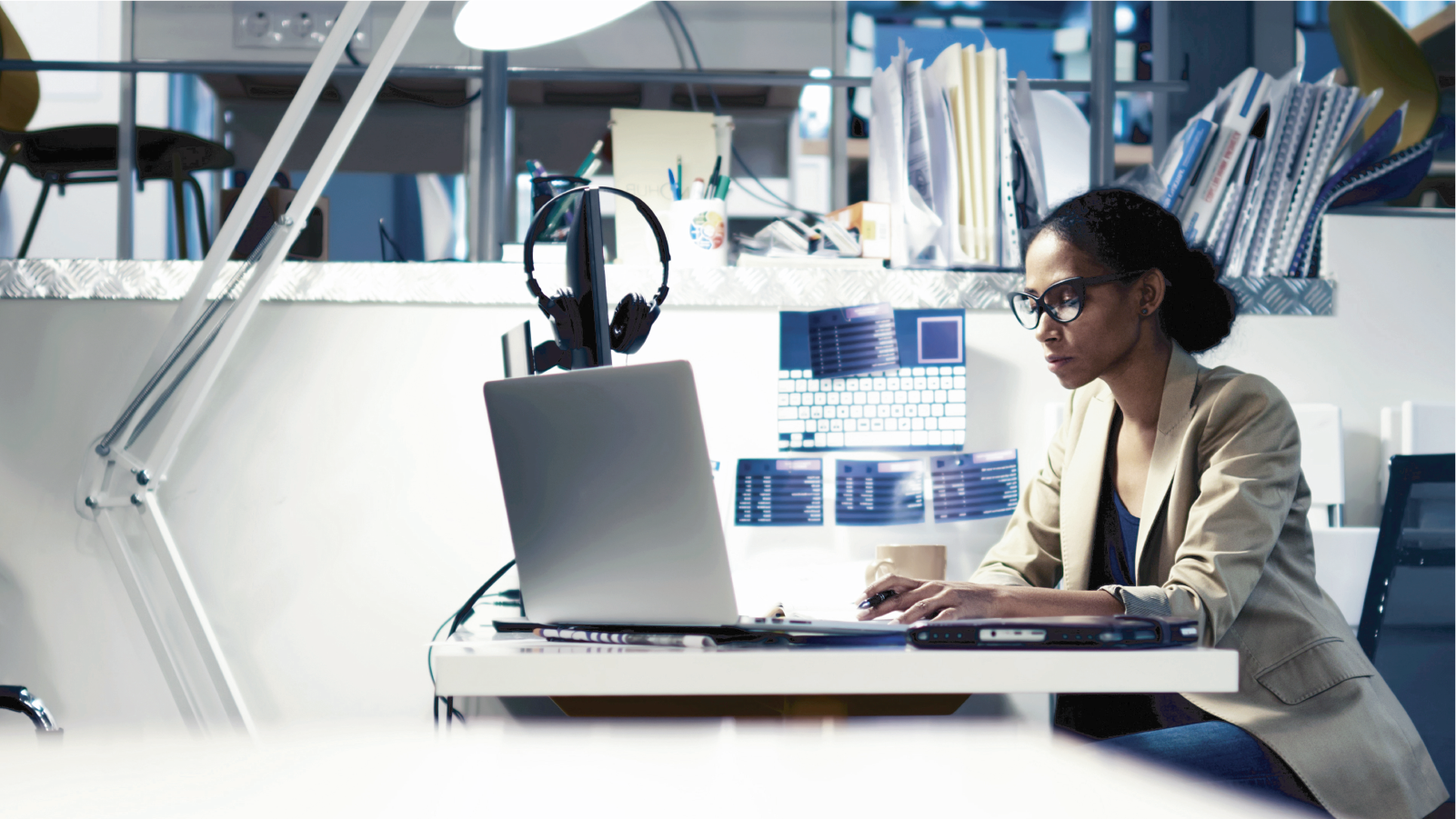 Woman working on a computer in her office