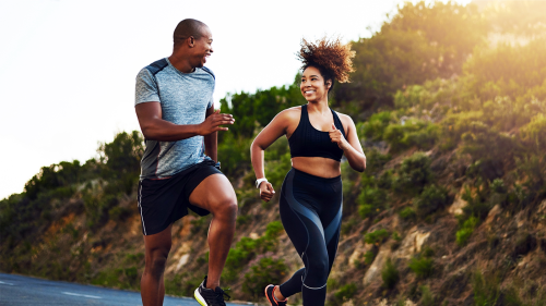 A man and women jogging