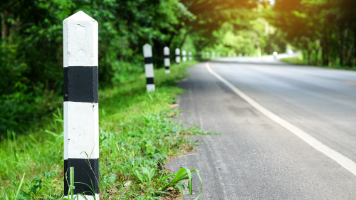 Milestone markers on a road