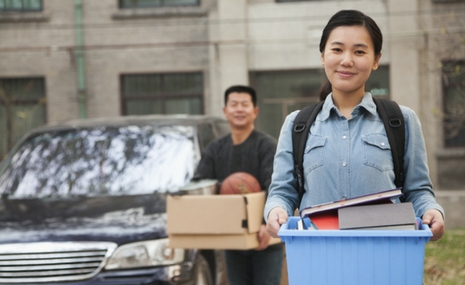 College Student Moving into Dorm