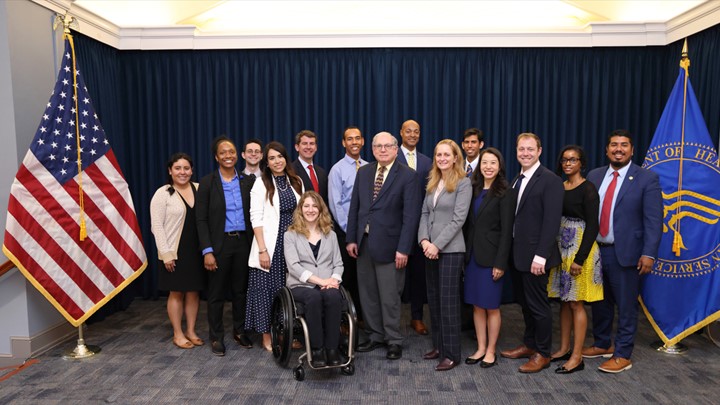 Group photo showing Drs. Tabak and Schwetz with White House Fellows